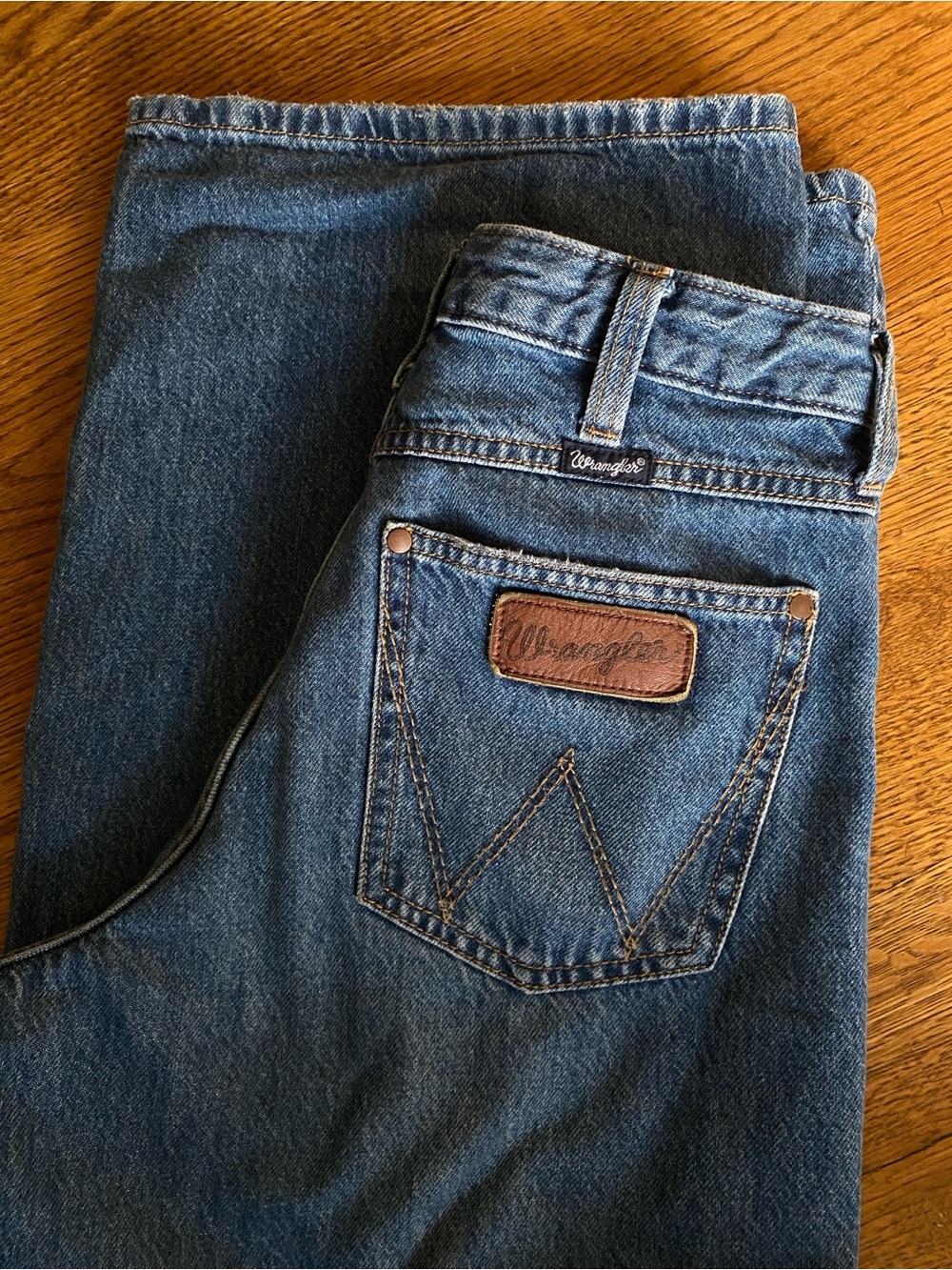 Wrangler Straight Leg Denim Jeans in Blue with Brown Patch